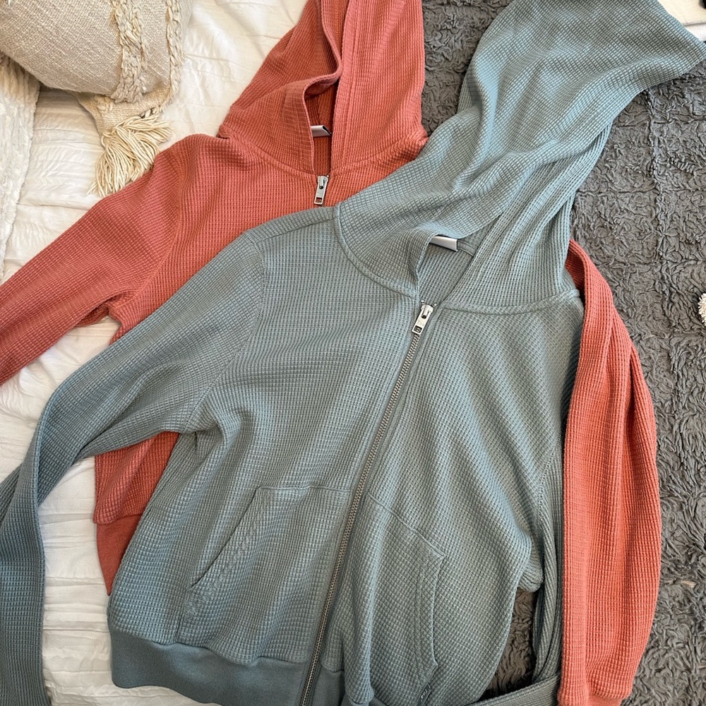 Aritzia TNA zip ups